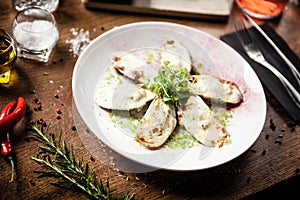 Cooked green mussels with parmegano and cream cheese