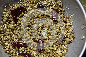 cooked greengram with chilly closeup