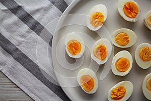 Cooked Hard Boiled Eggs on a Plate, top view. Copy space