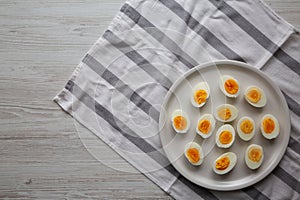 Cooked Hard Boiled Eggs on a Plate, top view. Copy space