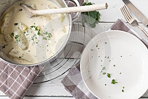 Cooked Kohlrabi with bechamel sauce in a pot for dinner or lunch side dish