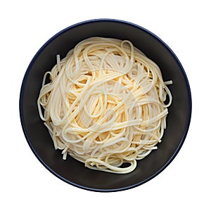 cooked linguine pasta on circle black bowl isolated on white