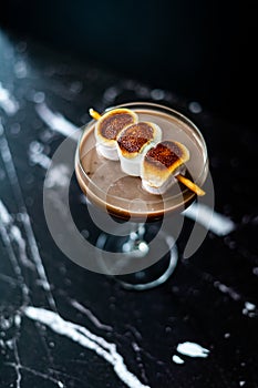 Cooked Marshmallow Cocktail with Pretzel Sticks  also Called Sweet Baby or Babyccino