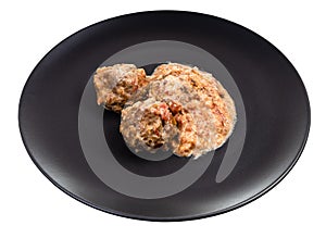 Cooked meatballs with rice on plate isolated