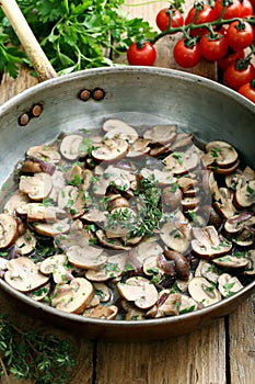 Cooked mushroom in metal pan