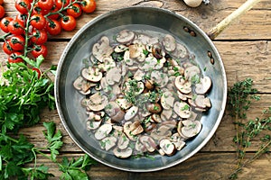 Cooked mushroom in metal pan