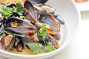 Cooked mussels in a with bowl