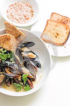 Cooked mussels in a with bowl