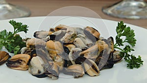 Cooked mussels with parsley and white wine