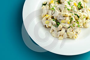 Cooked pasta with flaked tuna and sweetcorn in mayonnaise dressing