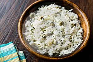 Cooked Plain Basmati Rice with Dill and Green Peas / Pilav or Pilaf Served with Chopsticks.