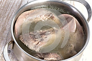 Cooked pork tongue in broth