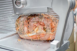 Cooked Prosciutto Cotto Ham With Herbs. Gourmet Meat Deli, Meat Slicer.