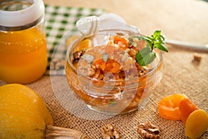 Cooked pumpkin porridge with rice, nuts and honey