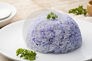 Cooked rice with anchan flower,purple rice from Butterfly pea (Clitoria ternatea L)