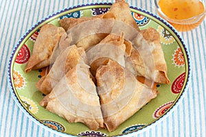 Cooked samosa in a plate on a table