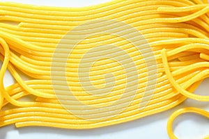Cooked spaghetti in a row