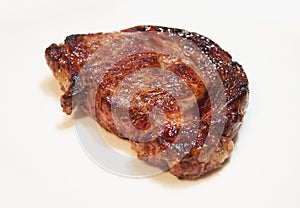 Cooked Tasty Juicy Ribeye Steak Isolated On Plate