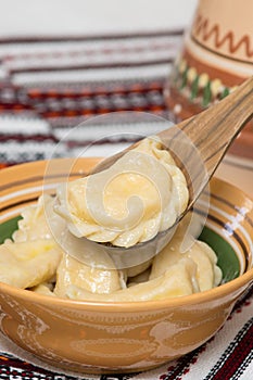 Cooked traditional Ukrainian hand-made varenyky (pierogi ruskie