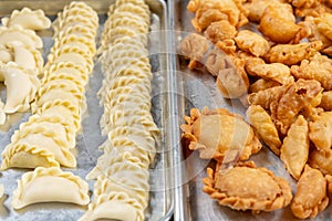 cooked & uncooked Guangdong-style crispy pastry dumplings for Chinese New Year photo