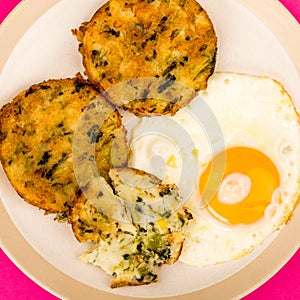 Cooked Vegetarian Bubble And Squeak Cakes With A Fried Egg