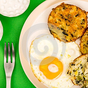 Cooked Vegetarian Bubble And Squeak Cakes With A Fried Egg