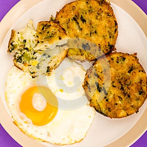 Cooked Vegetarian Bubble And Squeak Cakes With A Fried Egg