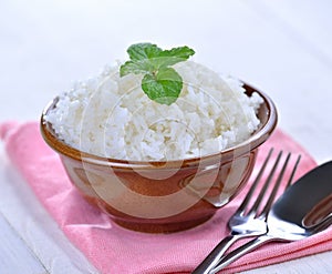 Cooked white rice garnished with mint