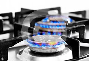 Cooker gas hob with flames burning