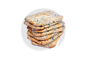 Cookie Cracker with spices is a stack on a white background.