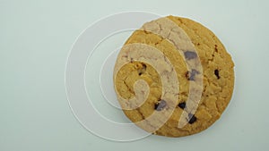 Cookie with strawberry and white chocolate on white background