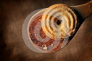 Cookie on wooden spoon ambient light