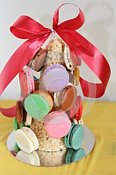 Cookies attached to rice krispie dome with red bow