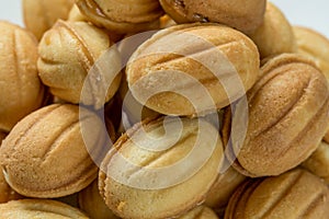 Cookies with boiled condenced milk close-up photo