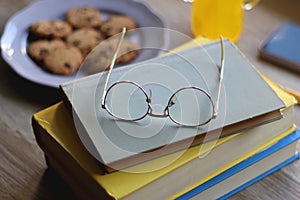 Cookies, Books, Glasses, Drink, Phone and Pen