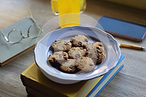 Cookies, Books, Glasses, Drink, Phone and Pen