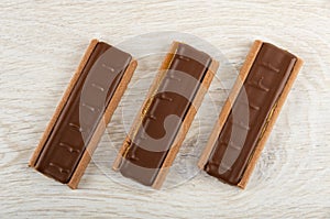 Cookies with chocolate and caramel on table. Top view