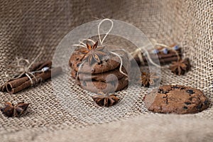 Cookies with chocolate and spices on the background of sackcloth