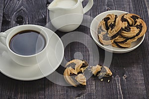 Cookies and coffeecookies and coffee on a wooden dark table/cookies and coffeecookies and coffee on a wooden dark table. Top view