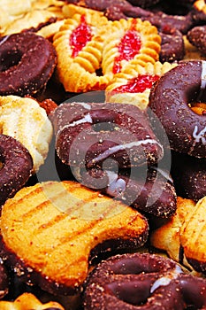 Cookies. Cookie crumpet tea biscuit pattern. Crumpets as background. Biscuits crumpet pattern texture. Chocolate coated photo