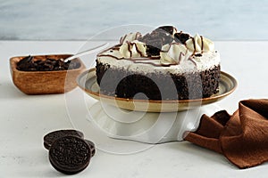 cookies and cream cake on a stand