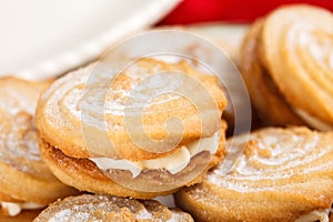 Viennese whirls cream cakes.  A close-up view.