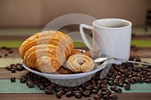 Cookies croissant with coffee