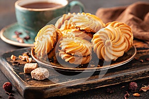 Cookies with cup of tea on a table