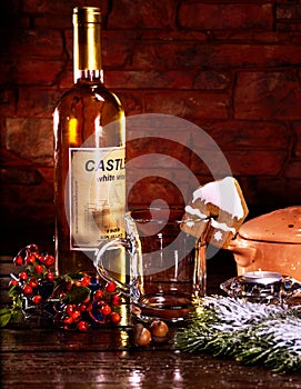 Cookies form of house decorated with mulled wine mug drink.