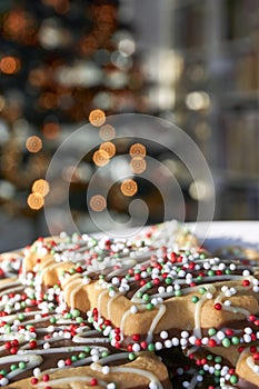 Cookies in front oaf a blurred Christmas tree