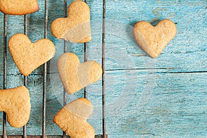 cookies - hearts on blue wooden background top view instagram s