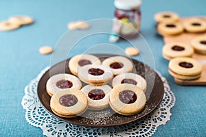Cookies with jam, biscuits on a brown plate