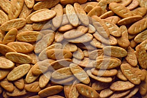 Cookies located on a flat surface occupies the entire area of the image