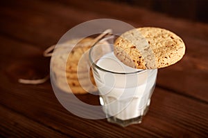 Cookies and milk. Chocolate chip cookies and a glass of milk. Vintage look.